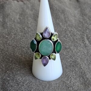 Elegant Silver Ring with Green and Purple Stones